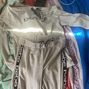 Bebe of the shoulder sweatsuit